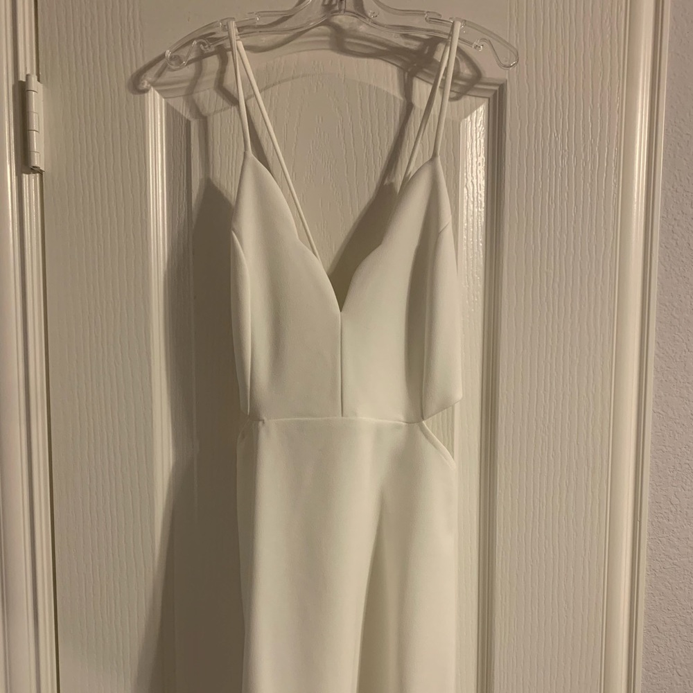 White spaghetti strap backless dress with side cut outs size S.
